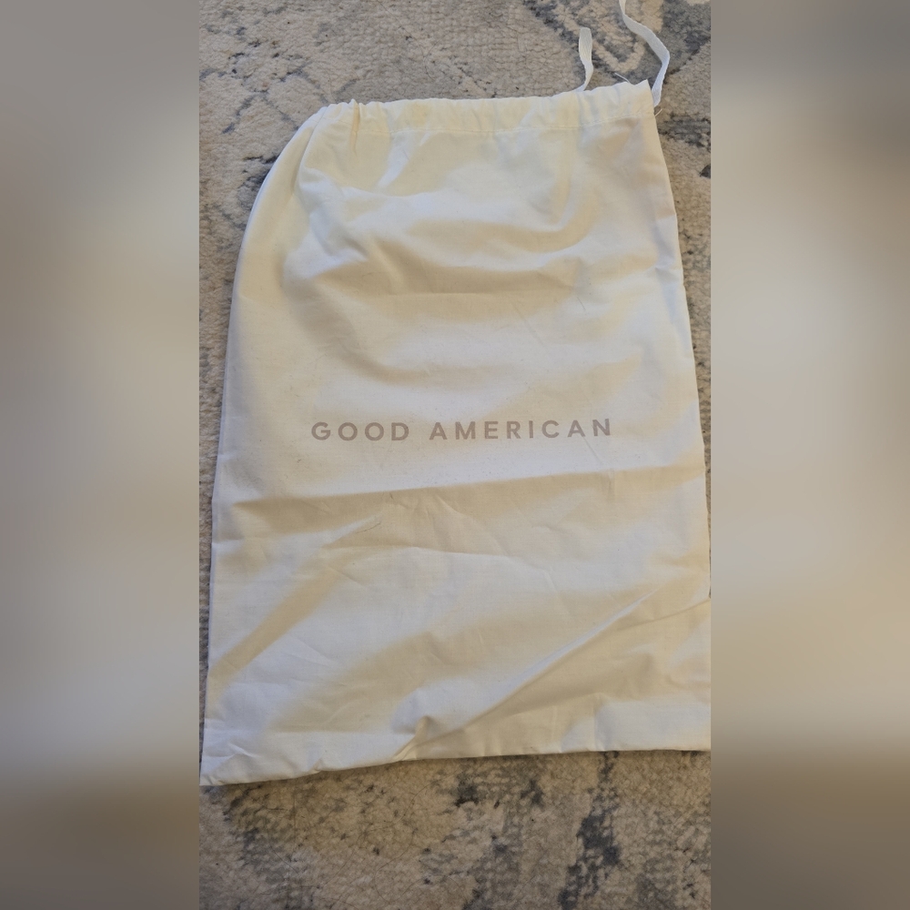 Beautiful And Never Used Good American Cream Dust Bag